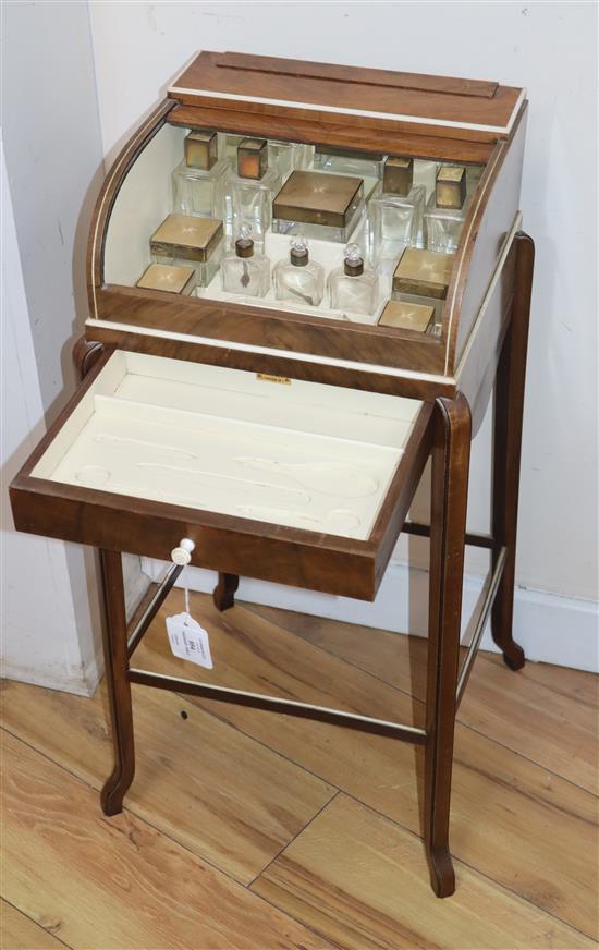 An Art Deco walnut ladies dressing table by George Betjemann & Sons Ltd for Maple & Co Ltd, W 1ft 1.5in D 1ft 0.5in H 2ft 5in